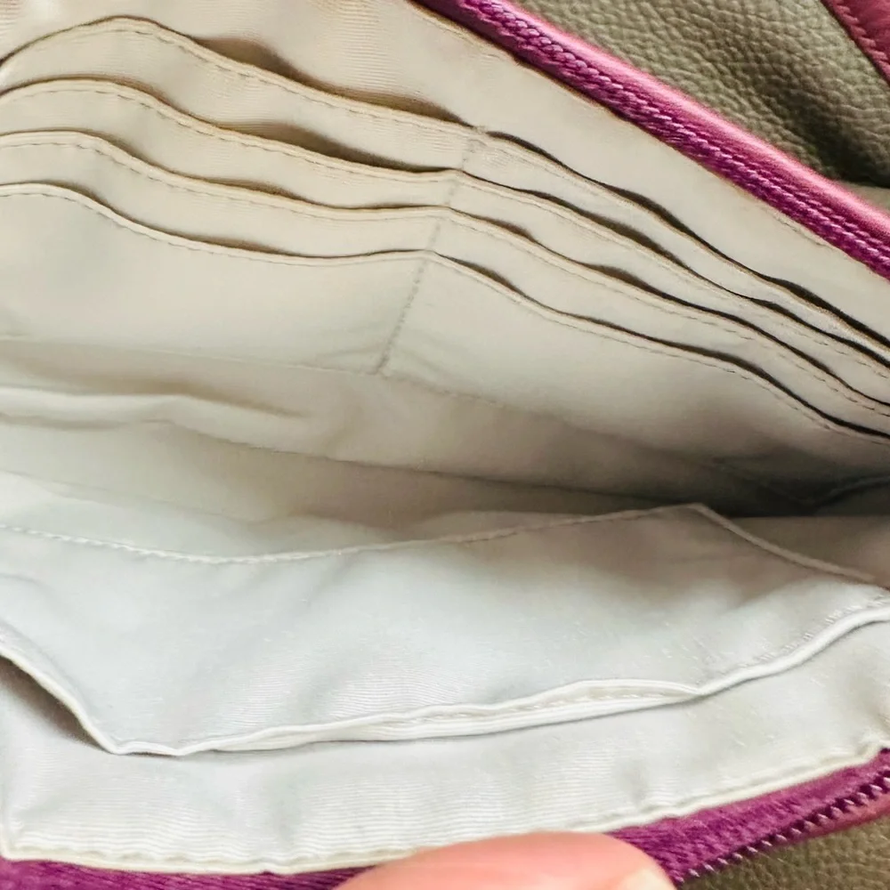 Coach Wristlet with suede flowers. Upstyled for a fresh new look. 9.25x5.5 x1”